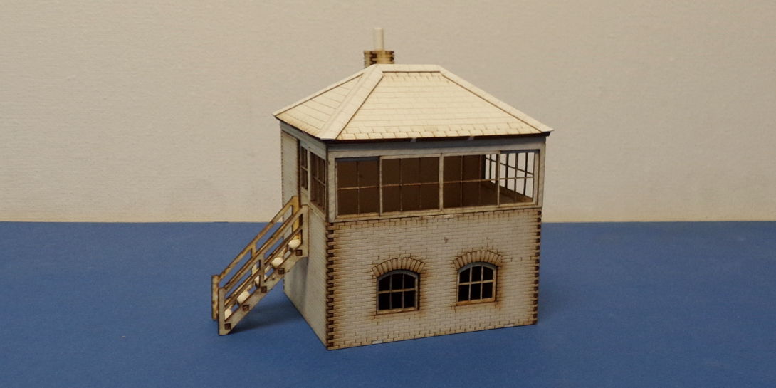 B 00-33 OO gauge Small L&CR/LMS signal box with L&R stairs options Small L&CR/LMS inspired by Shap Station signal box. Bundle contains parts to build this singal box in either left or right stair version.
